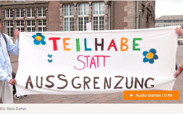 Foto mit Transparent: Teilhabe statt Aussgrenzung (Vorschau)